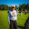 Muni Kids Bar Logo Golf Snapback Hat and PGA Dropout Crewneck on older woman