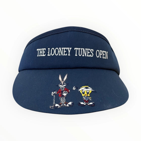 Navy visor with 'The Looney Tunes Open' text and cartoon characters on a white background