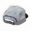 Gray cap with text and MAXFIL logo on a white background