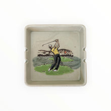  Ceramic tray with a golf-themed design on a white background