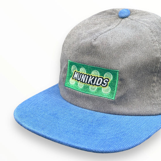 grey and blue corduroy muni kids golf hat