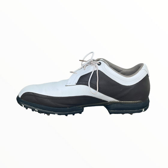 black and white golf shoes